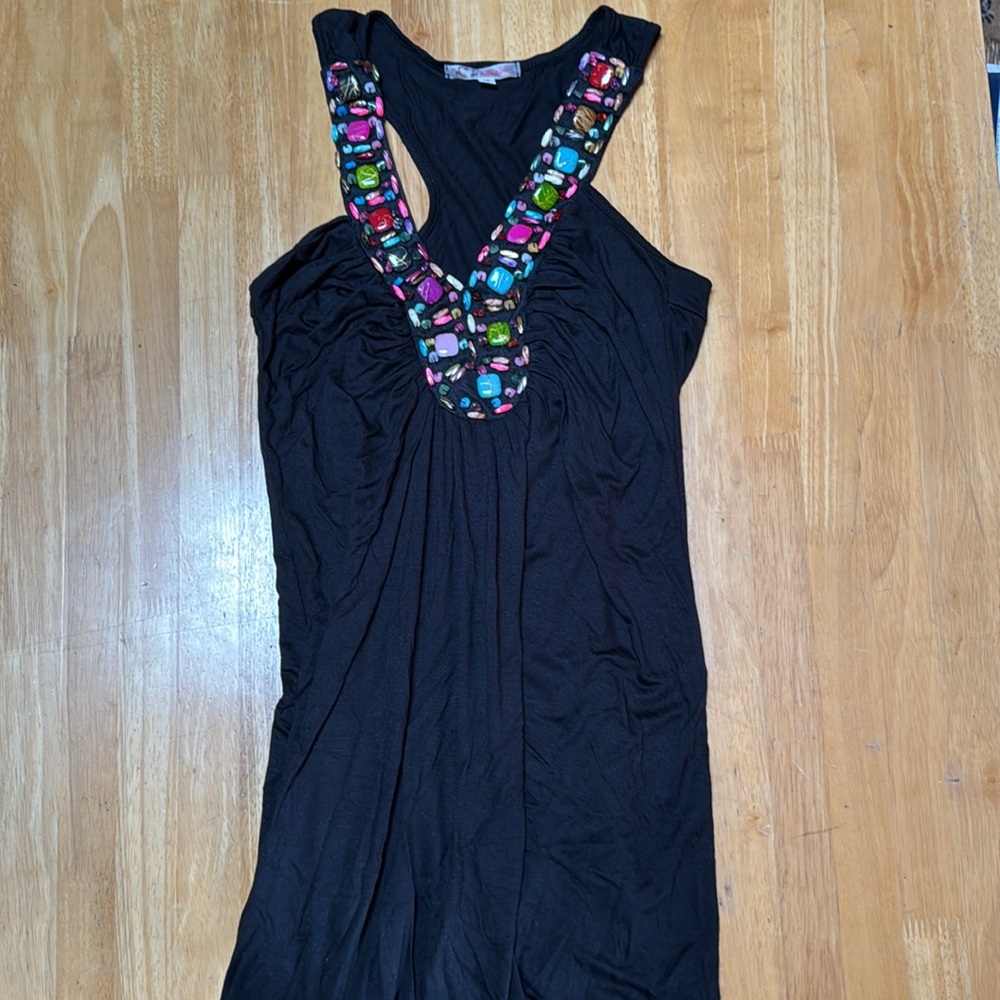 Mini-dress, bathing suit or swim suit cover up, or long top